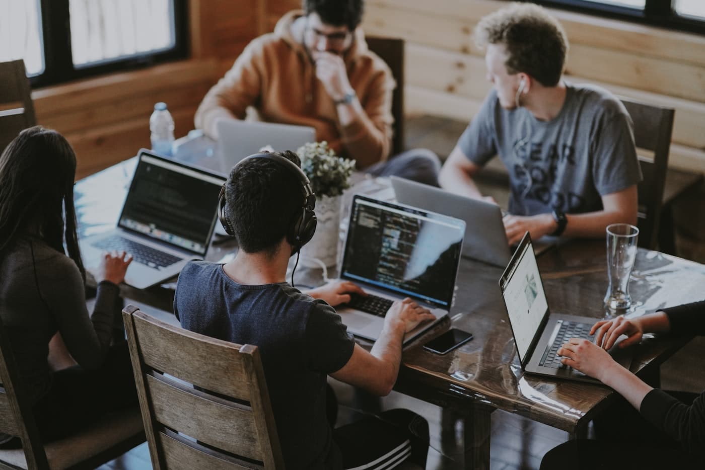 Software developers collaborating at computers