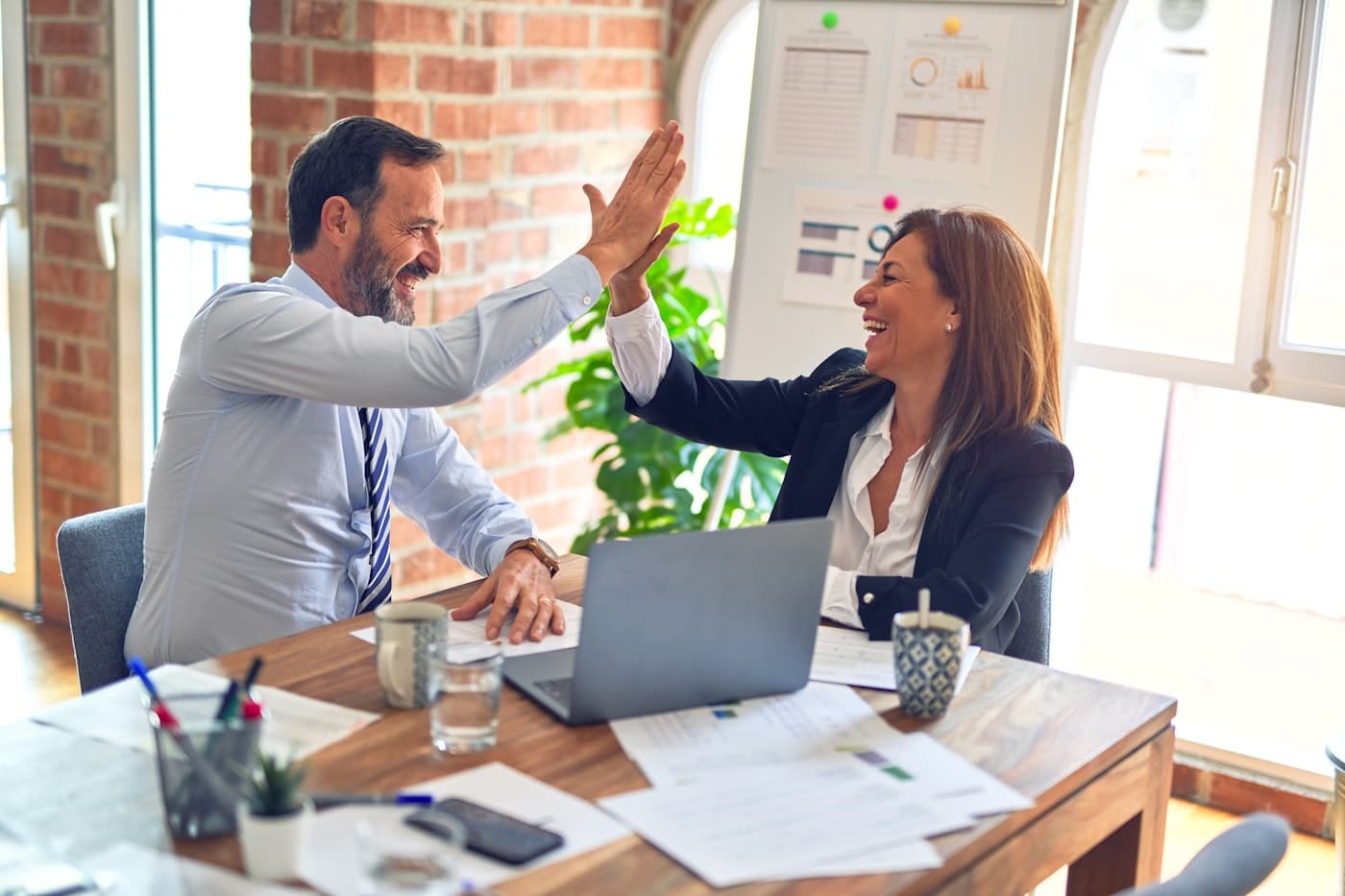 Professionals coordinating business operations