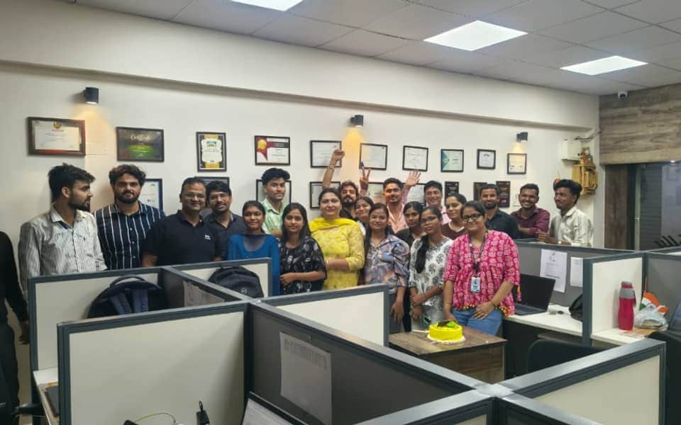 Software House team at the office awards wall